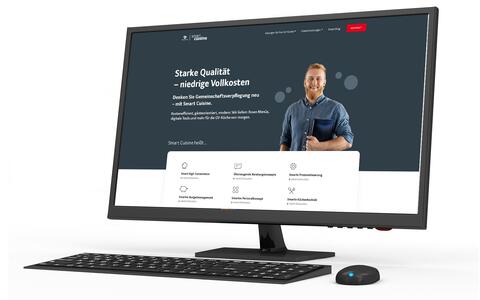 Startseite der Transgourmet Smart Cuisine Website auf einem modernen Bildschirm mit Tastatur und Mouse